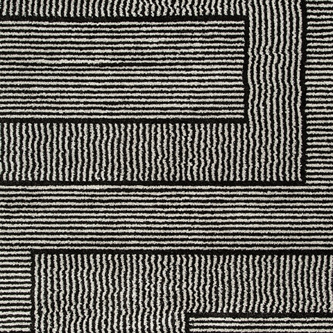 Kurtmen Black/Ivory Large Rug from Ashley Furniture - Luna Furniture