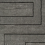 Kurtmen Black/Ivory Large Rug from Ashley Furniture - Luna Furniture