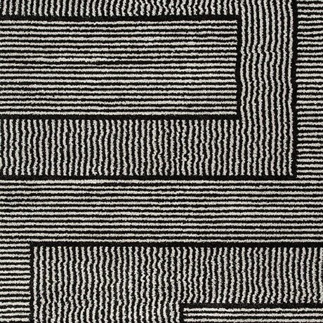 Kurtmen Black/Ivory Large Rug from Ashley Furniture - Luna Furniture
