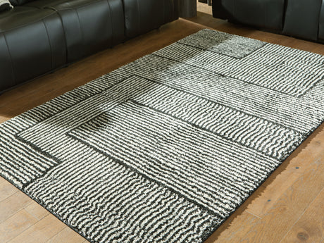 Kurtmen Black/Ivory Medium Rug from Ashley - Luna Furniture