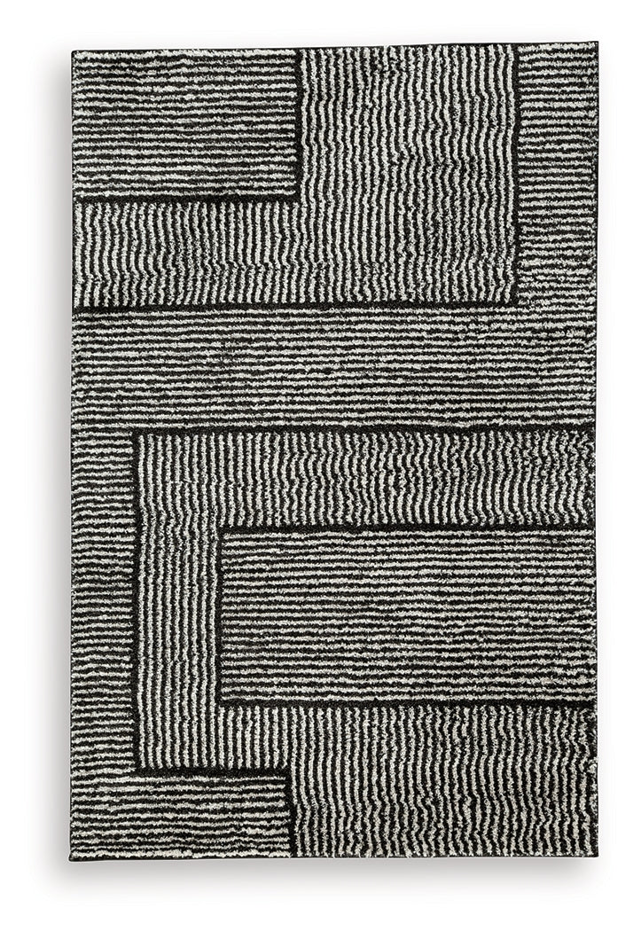 Kurtmen Black/Ivory Medium Rug from Ashley Furniture - Luna Furniture