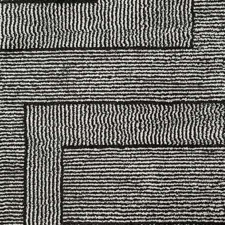Kurtmen Black/Ivory Medium Rug from Ashley Furniture - Luna Furniture