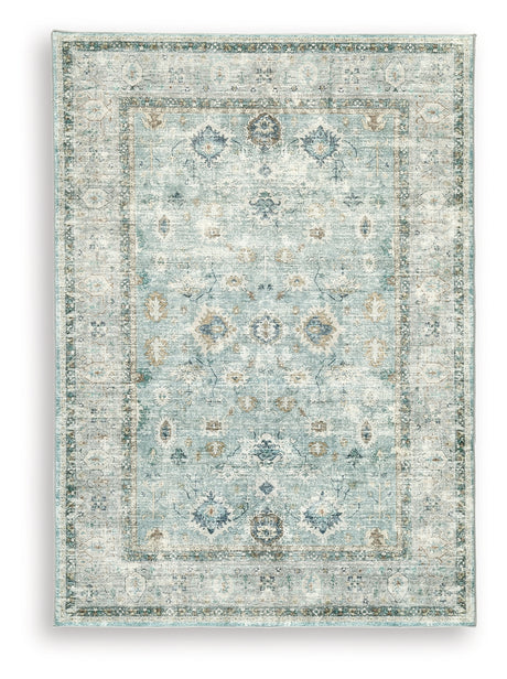 Ladstoney Teal/Beige/Ochre Medium Rug from Ashley Furniture - Luna Furniture