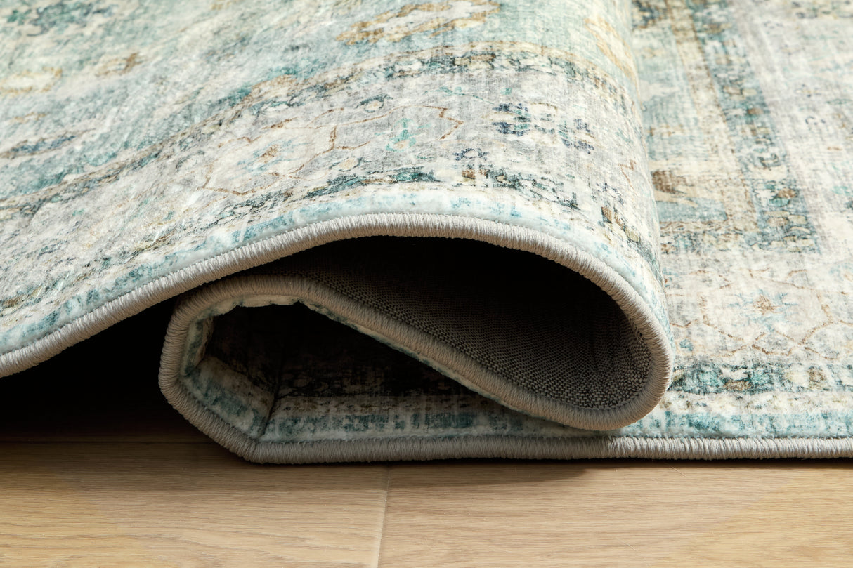 Ladstoney Teal/Beige/Ochre Medium Rug from Ashley Furniture - Luna Furniture