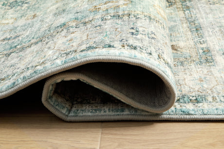 Ladstoney Teal/Beige/Ochre Medium Rug from Ashley Furniture - Luna Furniture