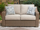 Laguna Heights Beige Outdoor Loveseat with Cushion from Ashley - Luna Furniture