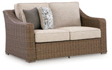 Laguna Heights Beige Outdoor Loveseat with Cushion from Ashley - Luna Furniture