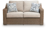 Laguna Heights Outdoor Sofa and Loveseat with Coffee Table in Beige from Ashley Furniture - Luna Furniture