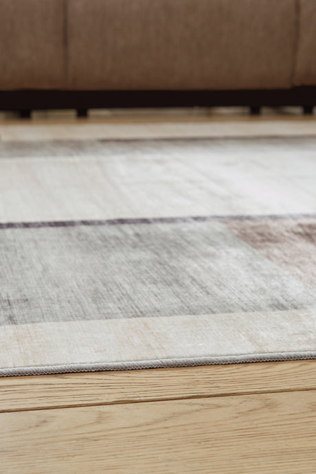 Larkport Cream/Brown/Gray Washable Medium Rug from Ashley - Luna Furniture