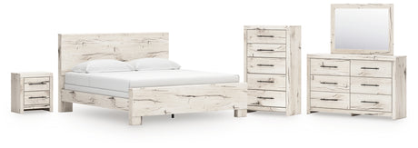 Lawroy King Panel Bed with Mirrored Dresser, Chest and Nightstand in Light Natural from Ashley - Luna Furniture