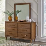 Lyncott Queen Upholstered Bed with Mirrored Dresser and Chest in Brown from Ashley - Luna Furniture