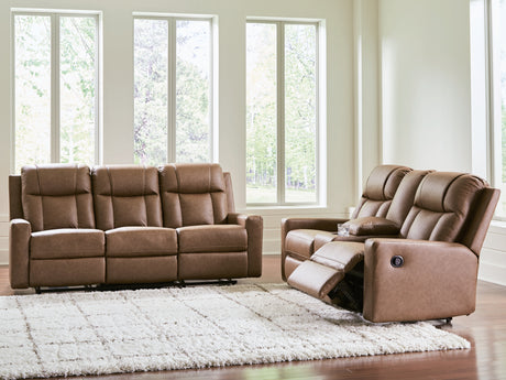 Mackmenville Reclining Sofa and Reclining Loveseat with Console in Caramel from Ashley Furniture - Luna Furniture
