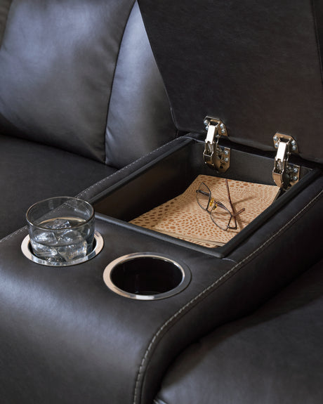 Mackmenville Reclining Sofa and Reclining Loveseat with Console in Carbon from Ashley Furniture - Luna Furniture