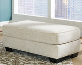 Monaghan Sandstone Ottoman from Ashley - Luna Furniture