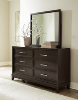 Neymorton King Upholstered Panel Bed with Mirrored Dresser and Chest in Dark Grayish Brown from Ashley - Luna Furniture