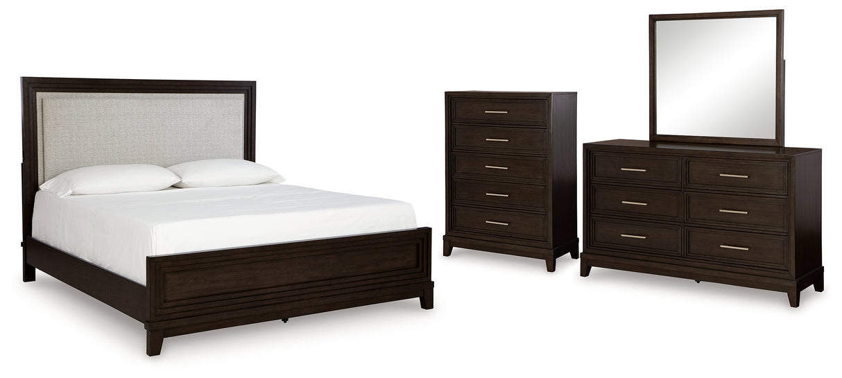 Neymorton King Upholstered Panel Bed with Mirrored Dresser and Chest in Dark Grayish Brown from Ashley - Luna Furniture