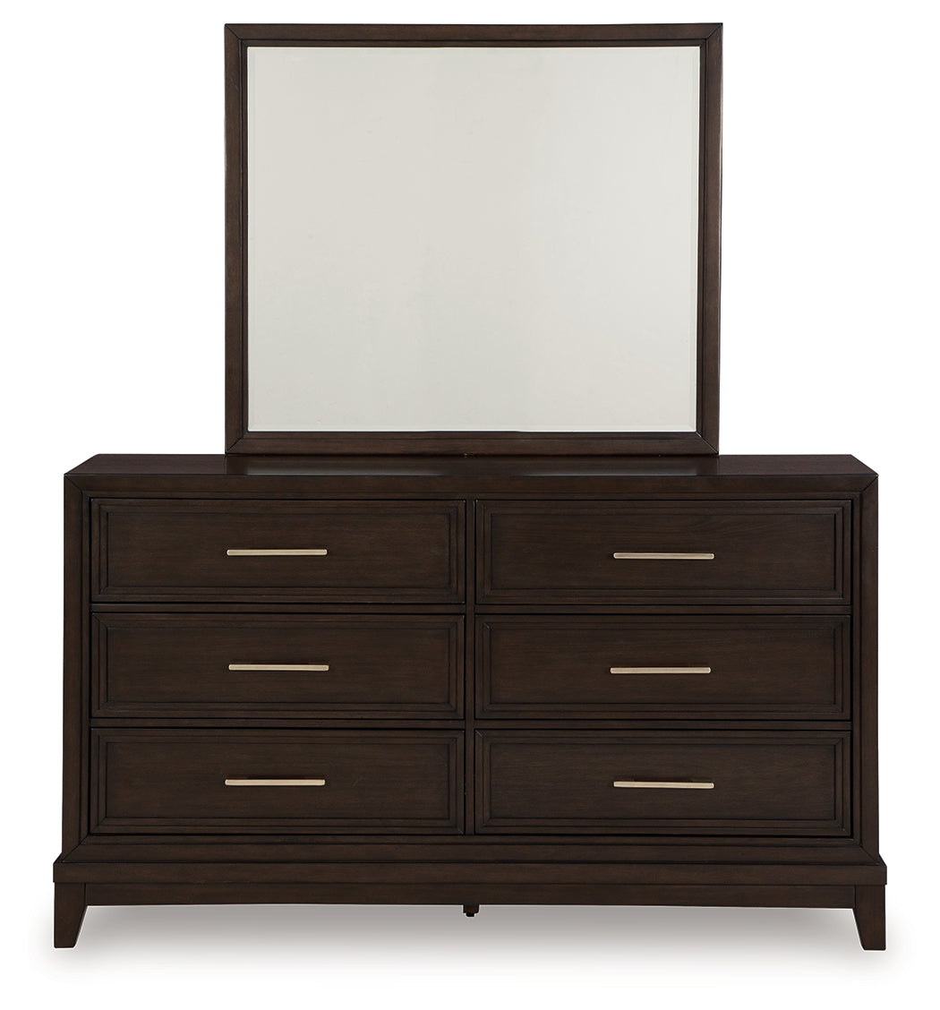Neymorton King Upholstered Panel Bed with Mirrored Dresser and Chest in Dark Grayish Brown from Ashley - Luna Furniture