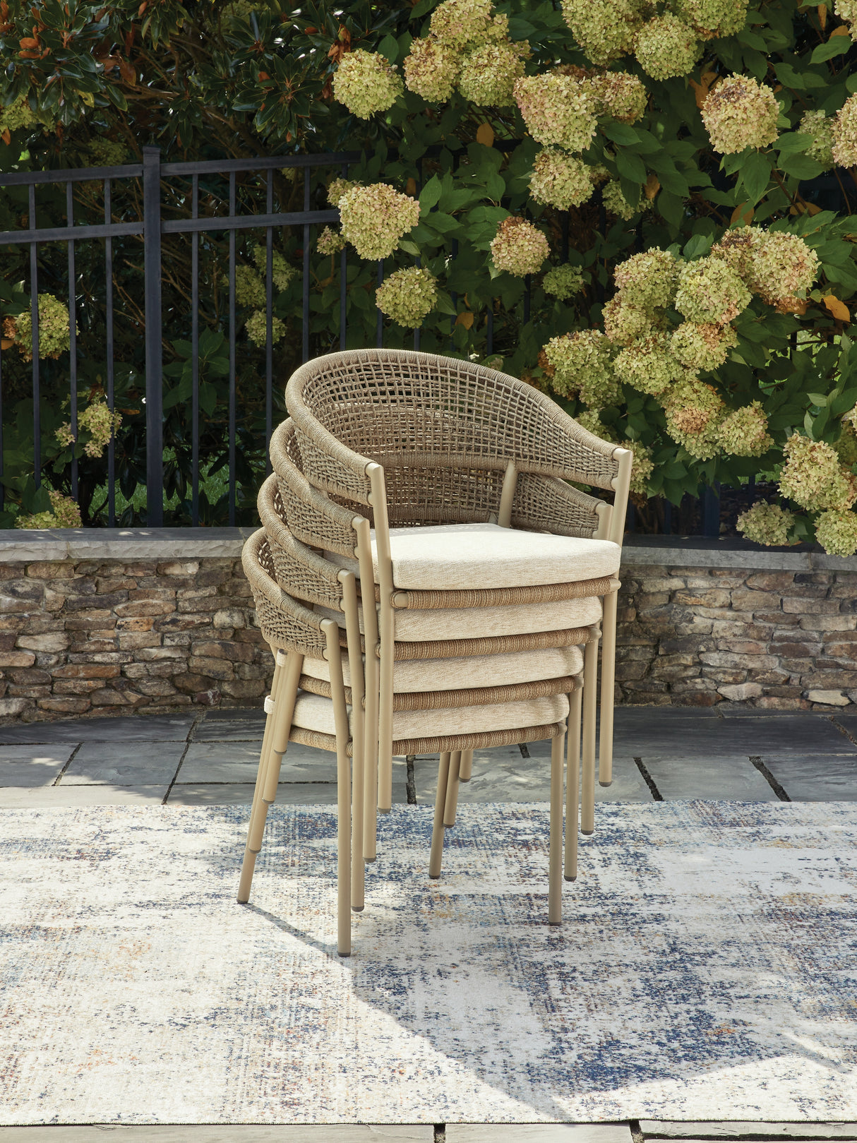 Orchard Beach Beige Outdoor Arm Chair with Cushion (Set of 4) from Ashley Furniture - Luna Furniture