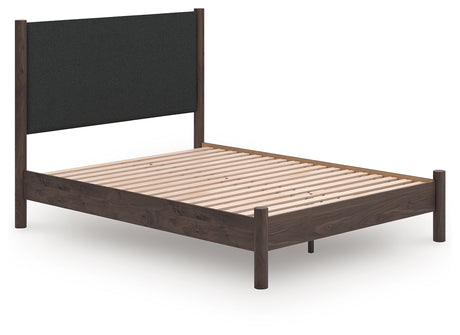 Pamytta Brown Queen Upholstered Panel Platform Bed from Ashley Furniture - Luna Furniture