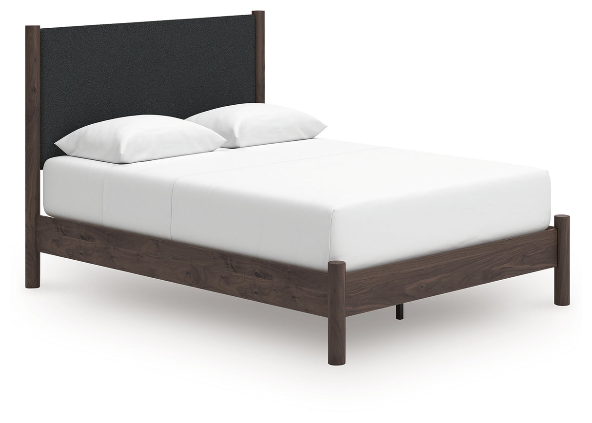 Pamytta Brown Queen Upholstered Panel Platform Bed from Ashley Furniture - Luna Furniture