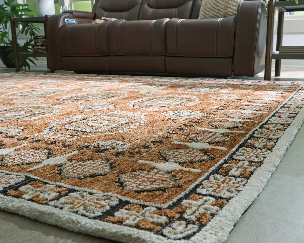 Qaabiz Sienna/Ivory/Black Large Rug from Ashley Furniture - Luna Furniture