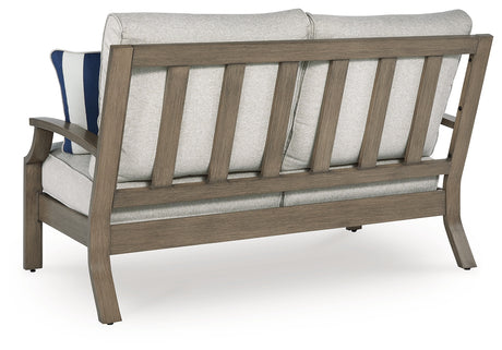 Rainier Ranch Outdoor Loveseat and 2 Chairs with Coffee Table in Brown/Beige from Ashley Furniture - Luna Furniture