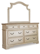 Realyn Chipped White California King Upholstered Panel Bed with Mirrored Dresser from Ashley Furniture - Luna Furniture