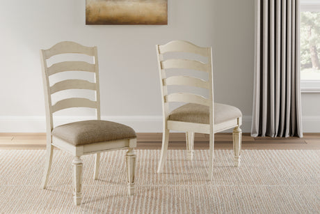 Realyn Chipped White Dining Table and 4 Chairs from Ashley - Luna Furniture