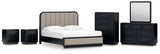 Rowanbeck California King Upholstered Panel Bed with Mirrored Dresser, Chest and 2 Nightstands in Gray/Black from Ashley - Luna Furniture