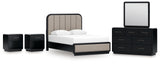 Rowanbeck Queen Upholstered Panel Bed with Mirrored Dresser and 2 Nightstands in Gray/Black from Ashley - Luna Furniture