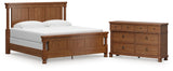 Rowlenstown California King Poster Bed with Dresser in Brown from Ashley - Luna Furniture
