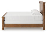 Rowlenstown California King Poster Bed with Mirrored Dresser in Brown from Ashley - Luna Furniture