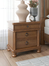 Rowlenstown Queen Poster Bed with Dresser and Nightstand in Brown from Ashley - Luna Furniture