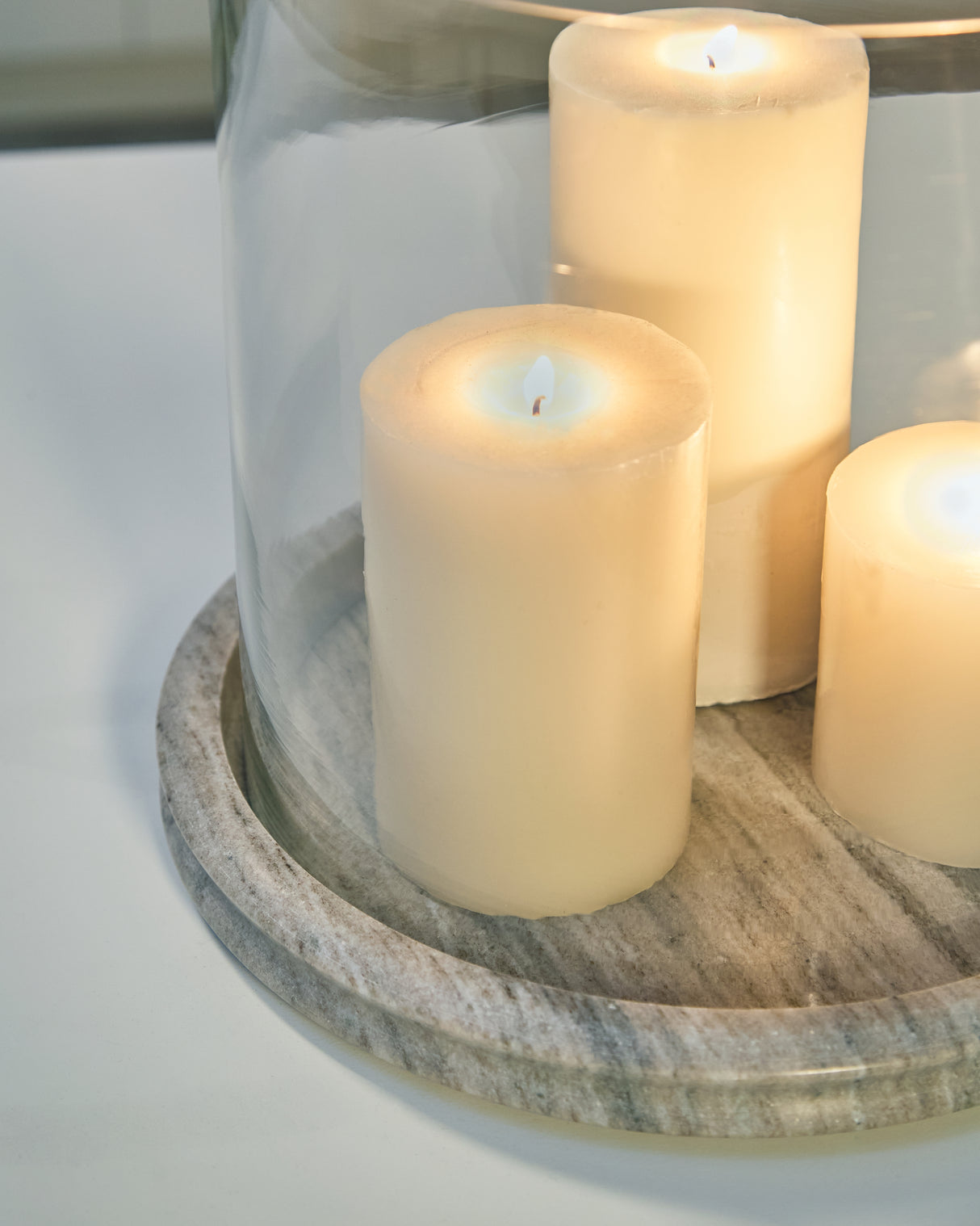 Saskia Clear/Beige Candle Holder from Ashley - Luna Furniture