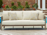 Serene Bay Dark Brown/White Outdoor Sofa with Cushion from Ashley - Luna Furniture