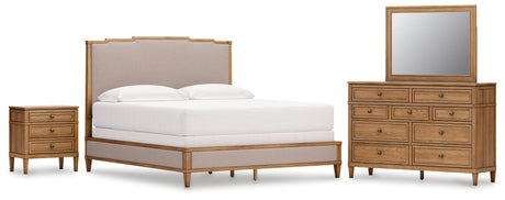 Sharlance California King Upholstered Panel Bed with Mirrored Dresser and Nightstand in Light Brown from Ashley - Luna Furniture