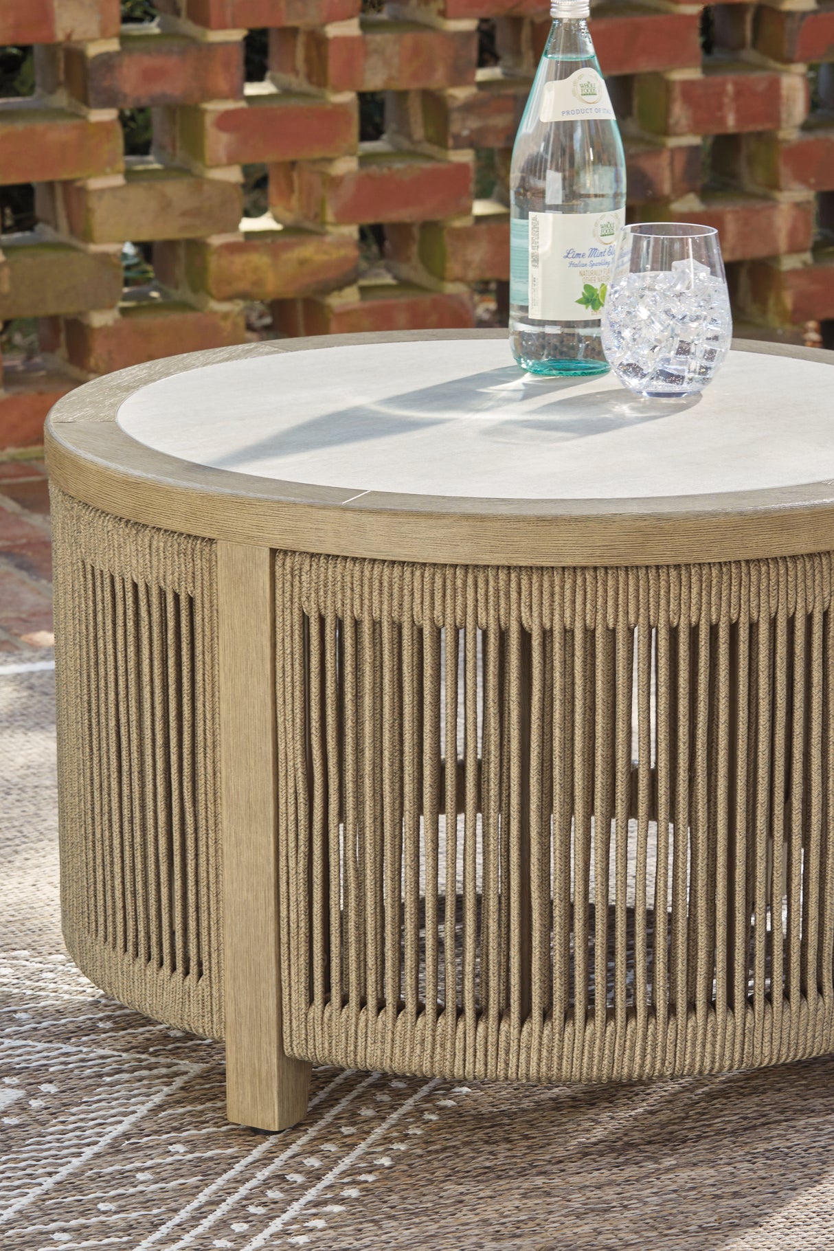 Spooners Cove Beige Outdoor Coffee Table from Ashley - Luna Furniture