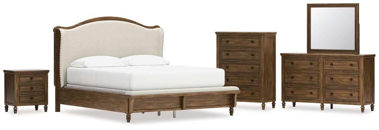 Sturlayne California King Upholstered Panel Bed with Mirrored Dresser, Chest and Nightstand in Brown from Ashley - Luna Furniture