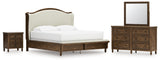 Sturlayne King Upholstered Panel Bed with Mirrored Dresser and Nightstand in Brown from Ashley - Luna Furniture