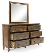 Sturlayne King Upholstered Panel Bed with Mirrored Dresser, Chest and 2 Nightstands in Brown from Ashley - Luna Furniture