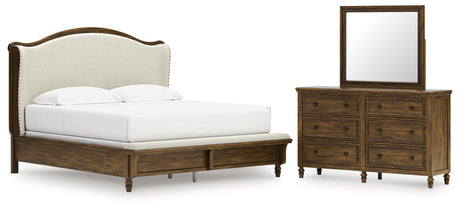 Sturlayne King Upholstered Panel Bed with Mirrored Dresser in Brown from Ashley - Luna Furniture