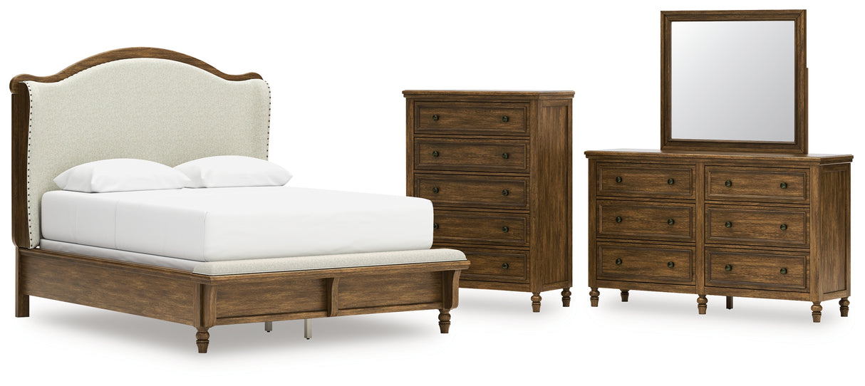 Sturlayne Queen Upholstered Panel Bed with Mirrored Dresser and Chest in Brown from Ashley - Luna Furniture