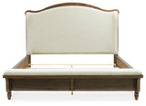 Sturlayne Queen Upholstered Panel Bed with Mirrored Dresser and Chest in Brown from Ashley - Luna Furniture