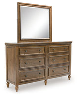 Sturlayne Queen Upholstered Panel Bed with Mirrored Dresser, Chest and Nightstand in Brown from Ashley - Luna Furniture