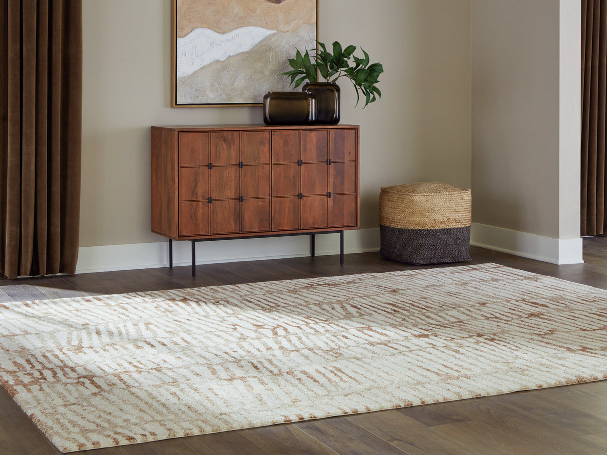 Uduak Cream/Tan/Rust Large Rug from Ashley - Luna Furniture