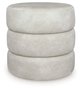 Ummi Bone Swivel Accent Ottoman from Ashley - Luna Furniture