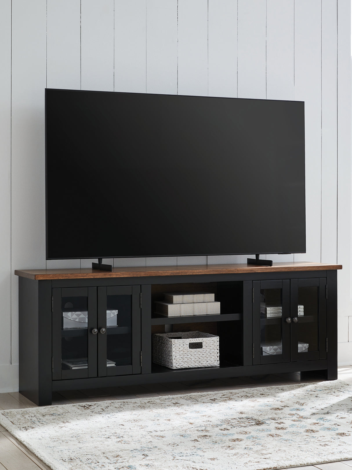 Wildenauer Brown/Black 76" TV Stand from Ashley - Luna Furniture