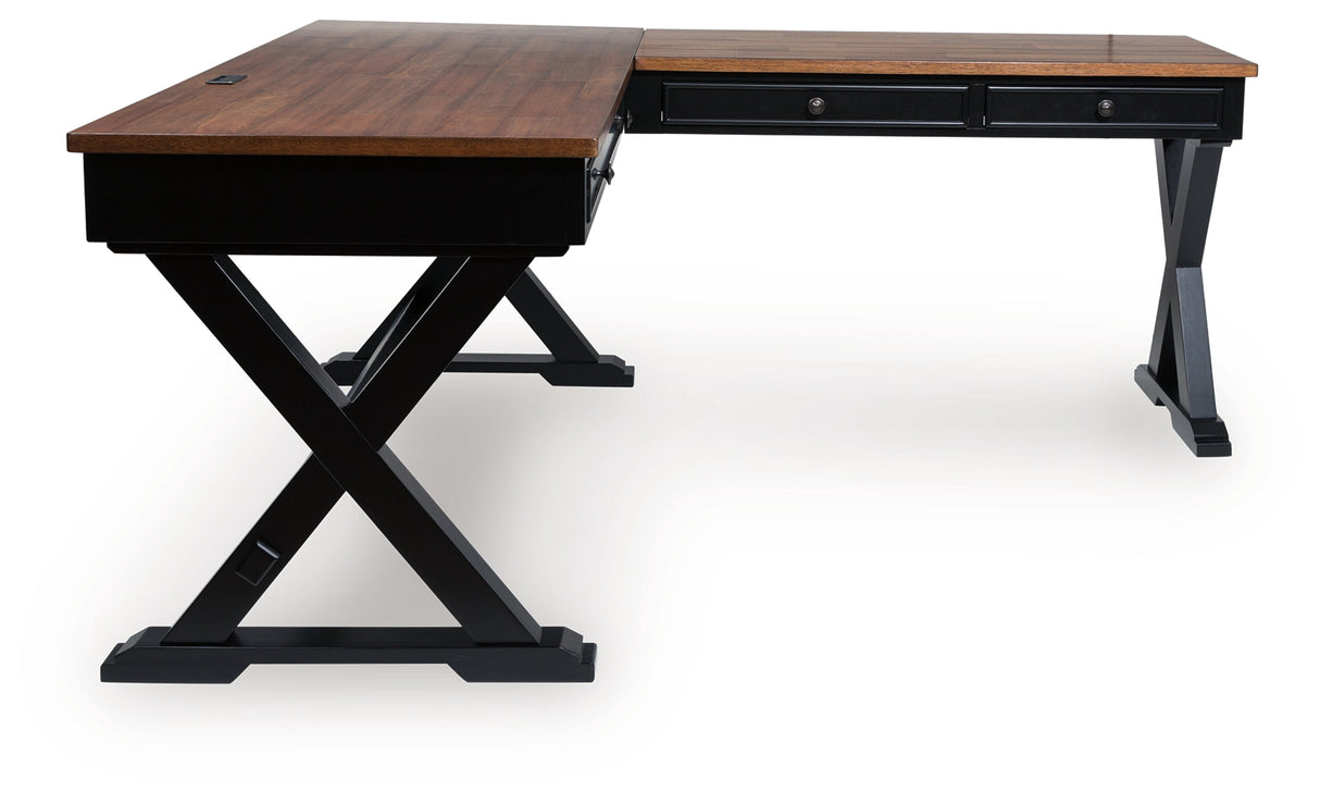 Wildenauer Brown/Black Home Office Desk from Ashley - Luna Furniture