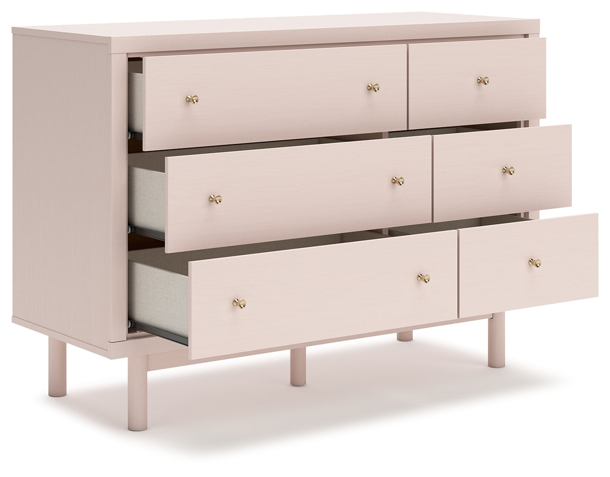 Wistenpine Twin Upholstered Panel Headboard with Dresser and 2 Nightstands in Blush from Ashley - Luna Furniture