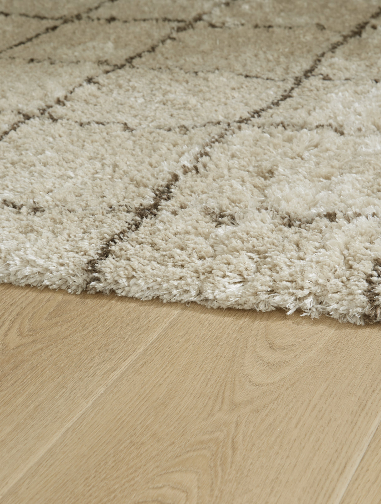 Wrenlow Cream/Brown Large Rug from Ashley - Luna Furniture